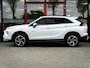 Mitsubishi Eclipse Cross 2.4 PHEV First Edition 4WD | Trekhaak | Navigatie | Stoelverwarming | Stuurwiel Verwarmd | HUD | DAB+ | Camera | Adaptieve Cruise Control | Parelmoer Lak | Origineel NL | 2e Eigenaar |