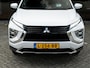 Mitsubishi Eclipse Cross 2.4 PHEV First Edition 4WD | Trekhaak | Navigatie | Stoelverwarming | Stuurwiel Verwarmd | HUD | DAB+ | Camera | Adaptieve Cruise Control | Parelmoer Lak | Origineel NL | 2e Eigenaar |