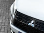 Mitsubishi Eclipse Cross 2.4 PHEV First Edition 4WD | Trekhaak | Navigatie | Stoelverwarming | Stuurwiel Verwarmd | HUD | DAB+ | Camera | Adaptieve Cruise Control | Parelmoer Lak | Origineel NL | 2e Eigenaar |