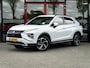 Mitsubishi Eclipse Cross 2.4 PHEV First Edition 4WD | Trekhaak | Navigatie | Stoelverwarming | Stuurwiel Verwarmd | HUD | DAB+ | Camera | Adaptieve Cruise Control | Parelmoer Lak | Origineel NL | 2e Eigenaar |