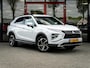 Mitsubishi Eclipse Cross 2.4 PHEV First Edition 4WD | Trekhaak | Navigatie | Stoelverwarming | Stuurwiel Verwarmd | HUD | DAB+ | Camera | Adaptieve Cruise Control | Parelmoer Lak | Origineel NL | 2e Eigenaar |
