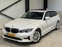 BMW 3-Serie Touring 320e Business Aut. | panorama | navi | trekhaak |