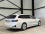 BMW 3-Serie Touring 320e Business Aut. | panorama | navi | trekhaak |