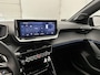 Peugeot 208 GT Hybrid 136pk Automaat | Navigatie | Panoramadak | Camera v+a | Climate Control | Adaptieve Cruise Control | Parkeersensoren v+a | Armsteun | Keyless | Full Led koplampen | Dodehoeksensor| Half lederen sportstoelen | Bluetooth | Apple CarPlay / Android Auto | DAB+ radio | Donker getint glas | 17" lichtmetalen velgen |