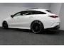 Mercedes-Benz CLA Shooting Brake 220 AMG Line / CLA45 AMG Diffuser / Panamericana Grill / Panoramadak / Burmester Surround Sound / Stoelverwarming / LED High Performance koplampen / Nightpakket / Agility Control / Trekhaak (zwenkbaar) / Ambienteverlichting / Widescreen / 19'' LMV / Elektr. bedienbare achterklep / Dodehoekdetectie / Adaptive Cruise Control / Navigatie