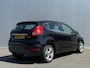 Ford Fiesta 1.25 Titanium 82 pk | Climate Control | Voorruitverwarming | Cruise | Park. Sensor achter |