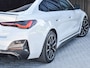 BMW i4 eDrive40 High EXECUTIVE 84 kWh | M-SPORT | SCHUIFDAK | SHADOW-LINE | NL- AUTO | CAMERA | HEAD-UP | TREKHAAK | MEMORY SEATS | AMBIANCE INTERIEUR |