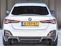 BMW i4 eDrive40 High EXECUTIVE 84 kWh | M-SPORT | SCHUIFDAK | SHADOW-LINE | NL- AUTO | CAMERA | HEAD-UP | TREKHAAK | MEMORY SEATS | AMBIANCE INTERIEUR |