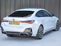 BMW i4 eDrive40 High EXECUTIVE 84 kWh | M-SPORT | SCHUIFDAK | SHADOW-LINE | NL- AUTO | CAMERA | HEAD-UP | TREKHAAK | MEMORY SEATS | AMBIANCE INTERIEUR |