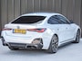 BMW i4 eDrive40 High EXECUTIVE 84 kWh | M-SPORT | SCHUIFDAK | SHADOW-LINE | NL- AUTO | CAMERA | HEAD-UP | TREKHAAK | MEMORY SEATS | AMBIANCE INTERIEUR |