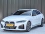 BMW i4 eDrive40 High EXECUTIVE 84 kWh | M-SPORT | SCHUIFDAK | SHADOW-LINE | NL- AUTO | CAMERA | HEAD-UP | TREKHAAK | MEMORY SEATS | AMBIANCE INTERIEUR |