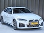 BMW i4 eDrive40 High EXECUTIVE 84 kWh | M-SPORT | SCHUIFDAK | SHADOW-LINE | NL- AUTO | CAMERA | HEAD-UP | TREKHAAK | MEMORY SEATS | AMBIANCE INTERIEUR |