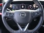 Opel Mokka-e Electric EV Level 4 50 kWh 136 pk | Navigatie | Achteruitrijcamera | Parkeersensoren Voor en Achter | Voorstoelen Verwarmd | LED Koplampen | Keyless Start | Dodehoek Detectie | Verwarmd Lederen Stuurwiel | 17" Lichtmetalen Velgen | Apple Carplay/Android Auto |