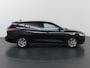 Ford Focus Wagon 1.0 EcoBoost Hybrid Titanium | Winterpakket | Cruise Control Adaptief | Parkeercamera | Navigatie |