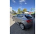 Alfa Romeo Giulietta 1.4 T Distinctive Stap in, voel de Alfa-beleving. Voorzien van o.a.:  Carplay, Leder, Stoelverwarming, Parkeersensoren en Automaat