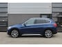 BMW X1 xDrive20i High Executive / HUD / Leer / Camera / N.A.P.