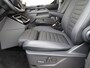 Ford Tourneo Custom 2.5 Plug-IN Hybrid 233 PK L2H1 Titanium X | Incl. BTW & BPM | 8 Persoons | Full Led Koplampen | Trekhaak Wegklapbaar | Blis | Adaptieve Cruise. | Elek. Schuifdeuren | Volledig Leder | Camera | Uit Voorraad Leverbaar