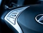 Hyundai ix20 1.4i i-Vision | Trekhaak | Schuif/ Kantel Dak | Airco | Climate Control | Panoramadak | Cruise Control | All Season Banden | Lichtmetalen Velgen 16'' | Mistlampen | Metallic Lak | Multifunctioneel Sturwiek |