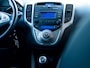 Hyundai ix20 1.4i i-Vision | Trekhaak | Schuif/ Kantel Dak | Airco | Climate Control | Panoramadak | Cruise Control | All Season Banden | Lichtmetalen Velgen 16'' | Mistlampen | Metallic Lak | Multifunctioneel Sturwiek |