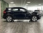 Volvo XC40 T4 Recharge Inscription | Trekhaak | Stoel en Stuurwielverwarming | Lederen bekleding | BLIS Dode Hoek Detectie | Cruise Control | Parkeercamera | 18 Inch | Keyless Drive | Parkeersensoren voor+achter | Elektrisch bedienbare achterklep | Climate Control L