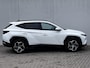 Hyundai Tucson 1.6 T-GDI HEV 230pk Premium Sky Automaat / Trekgewicht 1.650 kg / Glazen schuif-kanteldak / Leder / Stuur-, stoel- & achterbankverwarming / Stoelventilatie /