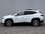 Hyundai Tucson 1.6 T-GDI HEV 230pk Premium Sky Automaat / Trekgewicht 1.650 kg / Glazen schuif-kanteldak / Leder / Stuur-, stoel- & achterbankverwarming / Stoelventilatie /