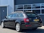 Skoda Octavia Combi 1.6 TDI Businessline | Panoramadak | Half leder | Navi | PDC | Climate control | Stoelverwarming