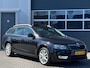 Skoda Octavia Combi 1.6 TDI Businessline | Panoramadak | Half leder | Navi | PDC | Climate control | Stoelverwarming