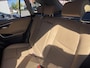 Toyota RAV4 2.5 Hybrid AWD Executive , lava red pearl met Beige Leder.