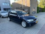 BMW 1-Serie 116i Sport Schuifdak Navi Airco PDC NAP APK