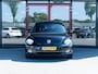 Volkswagen Beetle Cabriolet 1.2 TSI Cup | Stoelverwarming | 18'' Disc Velgen | Climate Control | Cruise Control | Parkeersensoren Voor & Achter | Regensensor | Automatisch Licht | Metallic Lak | Windscherm |