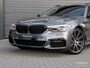 BMW 5-Serie Touring 520i M-Sport Pano Individual 20" Trekhaak Head-up HK Memory Camera