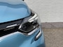 Renault Captur 1.6 E-Tech Plug-in Hybrid 160 Intens / Trekhaak / Climate control  / Cruise control  / Keyless entry  / Keyless start  / Parkeersensoren achter  / LED verlichting  / Multifunctioneel stuurwiel  / Navigatiesysteem full map  / Volledig digitaal instrumentenpaneel  / Bluetooth telefoonvoorbereiding  / Navigatie via Apple Carplay of Android Auto  / Apple Carplay  / Android Auto  / DAB+ radio  / Elektrische ramen voor en achter  / Elektrisch inklapbare spiegels  / Lichtmetalen wielen 18“ /