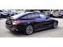 BMW i4 EDrive40 High Executive | Schuifdak | M-pakket | Laserlight | Iconic Sound | Driving Assistant Professional | BTW AUTO |