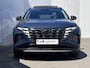 Hyundai Tucson 1.6 T-GDI HEV 230 Premium Sky Automaat / Goed onderhouden / Leder / Stuur-, stoel- en achterbankverwarming / Stoelventilatie / Navigatie / Apple Carplay Android / Winterbanden incl. /