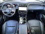 Hyundai Tucson 1.6 T-GDI HEV 230 Premium Sky Automaat / Goed onderhouden / Leder / Stuur-, stoel- en achterbankverwarming / Stoelventilatie / Navigatie / Apple Carplay Android / Winterbanden incl. /