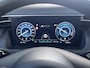 Hyundai Tucson 1.6 T-GDI HEV 230 Premium Sky Automaat / Goed onderhouden / Leder / Stuur-, stoel- en achterbankverwarming / Stoelventilatie / Navigatie / Apple Carplay Android / Winterbanden incl. /