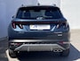 Hyundai Tucson 1.6 T-GDI HEV 230 Premium Sky Automaat / Goed onderhouden / Leder / Stuur-, stoel- en achterbankverwarming / Stoelventilatie / Navigatie / Apple Carplay Android / Winterbanden incl. /