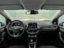 Ford Fiesta Titanium 100 pk | Navigatie | Achteruitrijcamera | Parkeersensoren Voor en Achter | Sportstoelen | LED Dagrijverlichting | Lederen Stuurwiel en Versnellingspook | Climate Control | Adaptieve Cruise Control | 16" Lichtmetalen Velgen | Apple Carplay/Android Auto |