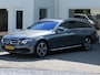 Mercedes-Benz E-klasse Estate 200 4MATIC Premium | Luchtvering | Achteruitrijcamera | Navigatie | Full-LED | Sfeerverlichting | Dodehoek detectie | Stoelverwarming | Elektrische achterklep