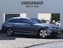 Mercedes-Benz E-klasse Estate 200 4MATIC Premium | Luchtvering | Achteruitrijcamera | Navigatie | Full-LED | Sfeerverlichting | Dodehoek detectie | Stoelverwarming | Elektrische achterklep