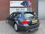 BMW 3-Serie Touring 320i High Executive / Leder / Navi / Cruise / Clima