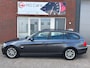 BMW 3-Serie Touring 320i High Executive / Leder / Navi / Cruise / Clima