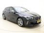 BMW 1-Serie M135i 306pk Aut xDrive -HeadUp -M Sportbesturing BMW 1SERIE M135i 306pk Aut xDrive -HeadUp -M Sportbesturing -Adaptief Onderstel -M Sportrem -Live Cockpit Prof -Harman/Kardon -WiFi -DAB