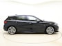BMW 1-Serie M135i 306pk Aut xDrive -HeadUp -M Sportbesturing BMW 1SERIE M135i 306pk Aut xDrive -HeadUp -M Sportbesturing -Adaptief Onderstel -M Sportrem -Live Cockpit Prof -Harman/Kardon -WiFi -DAB