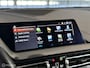 BMW 1-Serie M135i xDrive |Pano |HUD |H&K |Sfeer |Stuurverw.