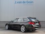 BMW 3-Serie Touring 320i High Executive | Panorama | Sportleer| Trekhaak | Org NL | Navi Prof | Camera | APK & OH Nieuw