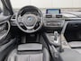 BMW 3-Serie Touring 320i High Executive | Panorama | Sportleer| Trekhaak | Org NL | Navi Prof | Camera | APK & OH Nieuw