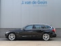 BMW 3-Serie Touring 320i High Executive | Panorama | Sportleer| Trekhaak | Org NL | Navi Prof | Camera | APK & OH Nieuw