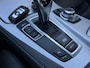 BMW 5-Serie 520i High Executive | Sportstoelen | Trekhaak | Flippers